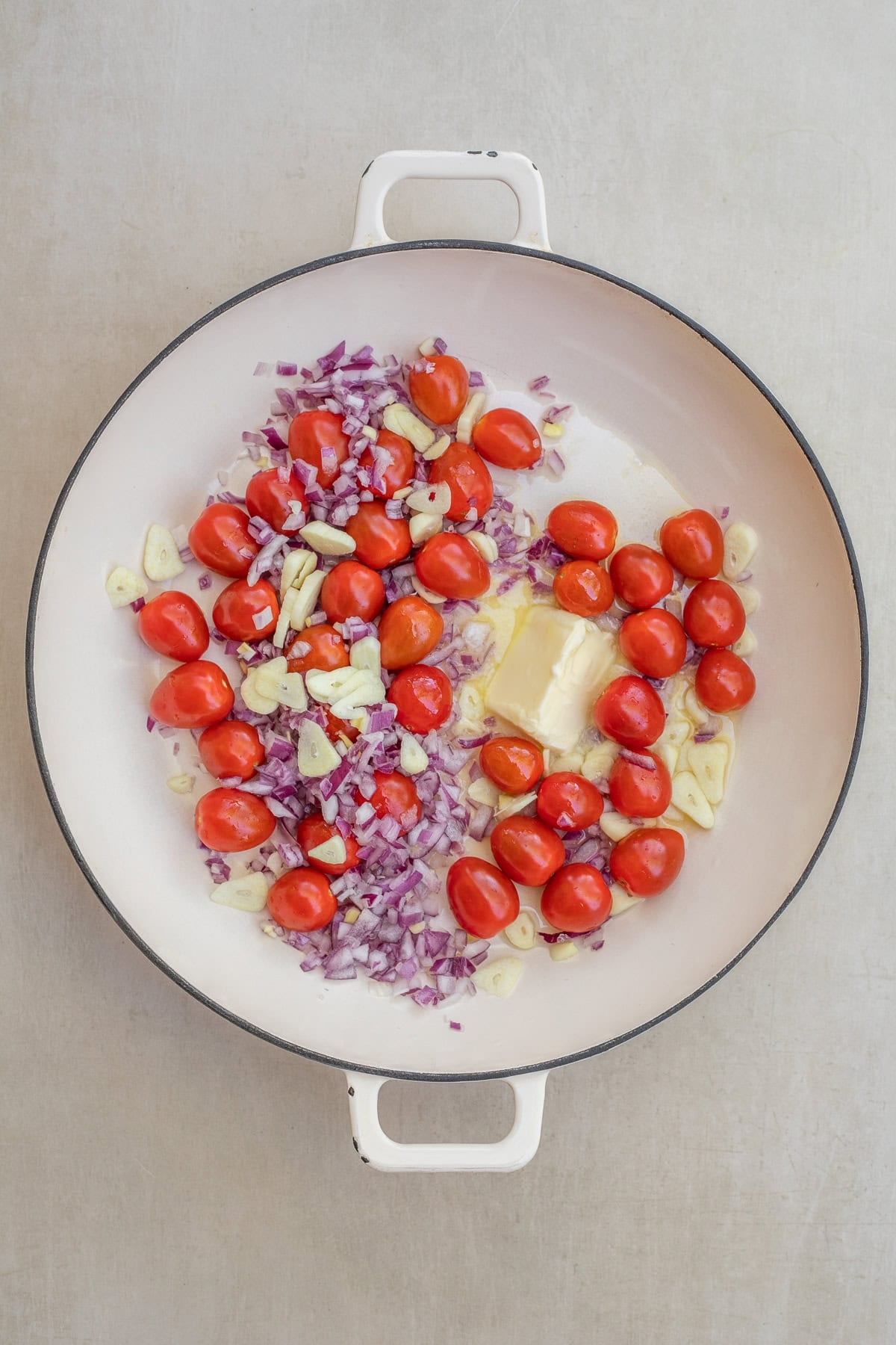 Best Boursin Tomato Pasta Recipe A pot with the tomato pasta sauce ingredients.