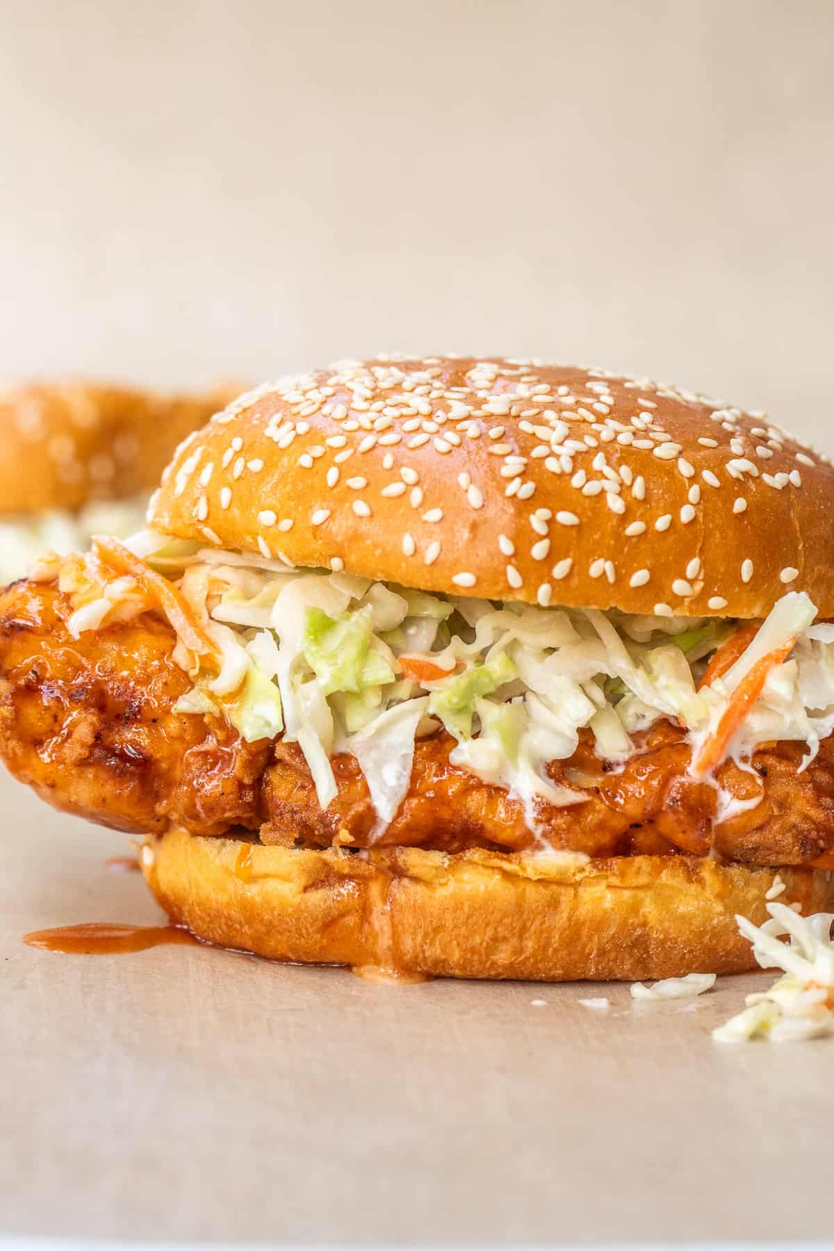 Easy Hot Honey Chicken Sandwich Recipe A hot honey fried chicken sandwich topped with crispy coleslaw.