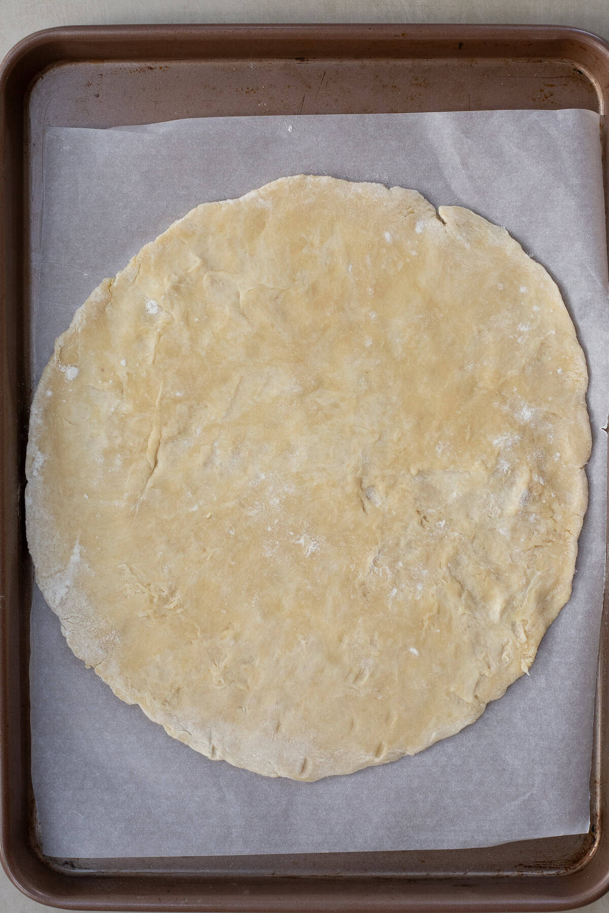 A savory mushroom galette made with tender mushrooms and a flaky homemade pastry crust. The rolled out mushroom galette dough.